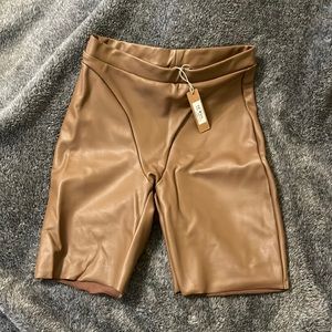SKIMS brown leather biker shorts
